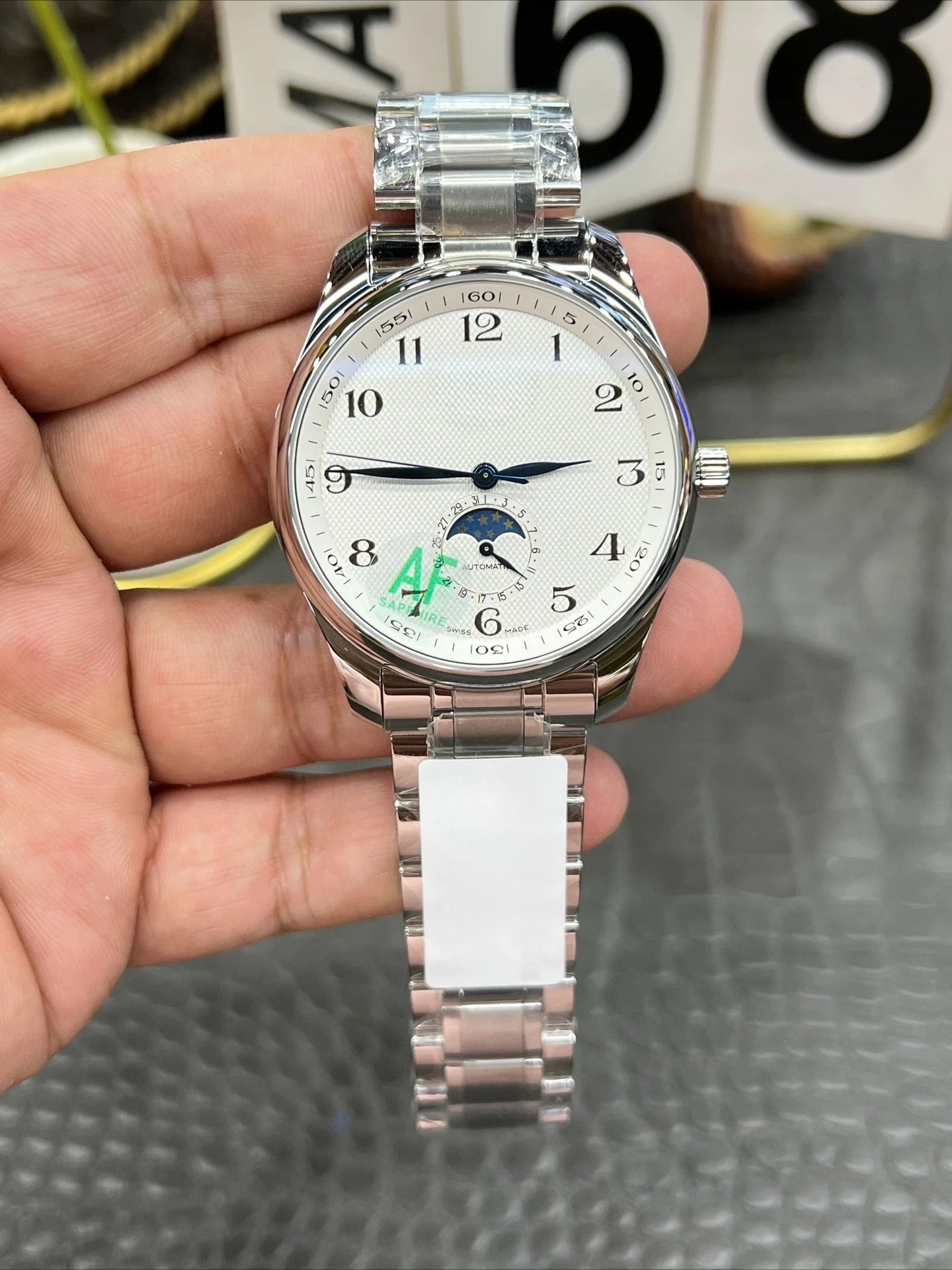 2026 New An Elegant Men's Watch with A Silver Dial and Moon Phase Display Suitable for Various Occasions